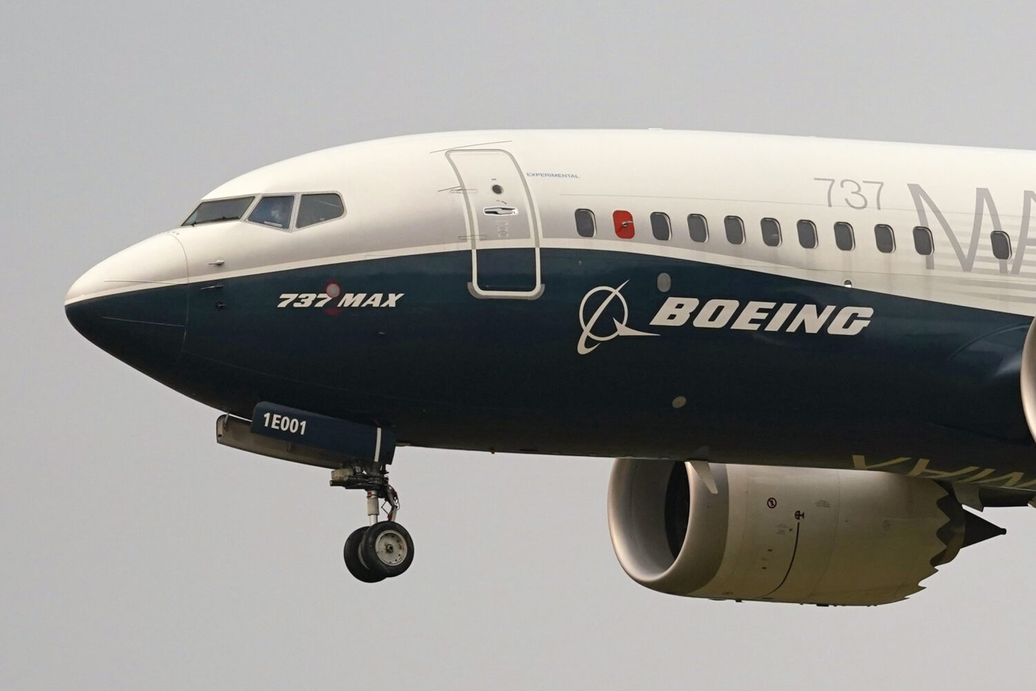 FILE - A Boeing 737 Max jet prepares to land at Boeing Field following a test flight in Seattle, Se...