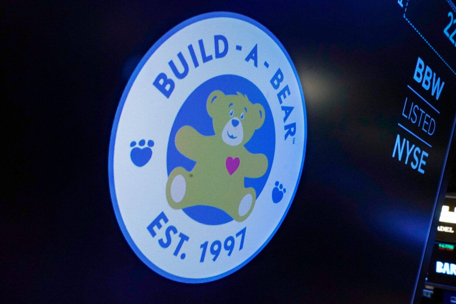 FILE - The logo for Build-A-Bear Workshop appears above a trading post on the floor of the New York...