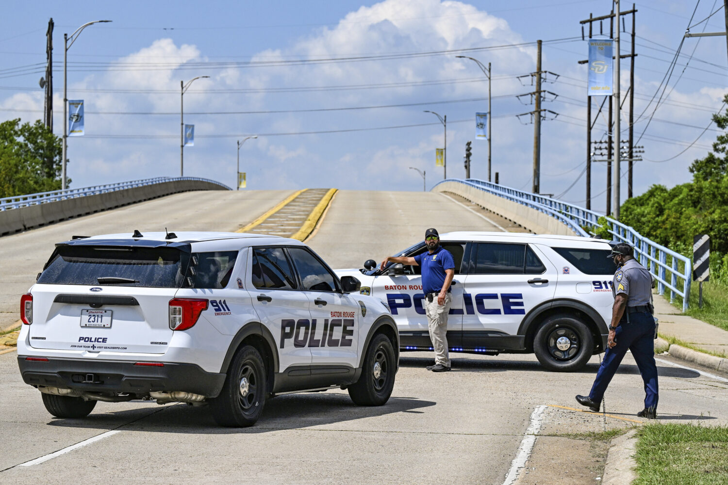 Baton Rouge Police block the entrance of Southern University's campus at the corner of Harding Boul...