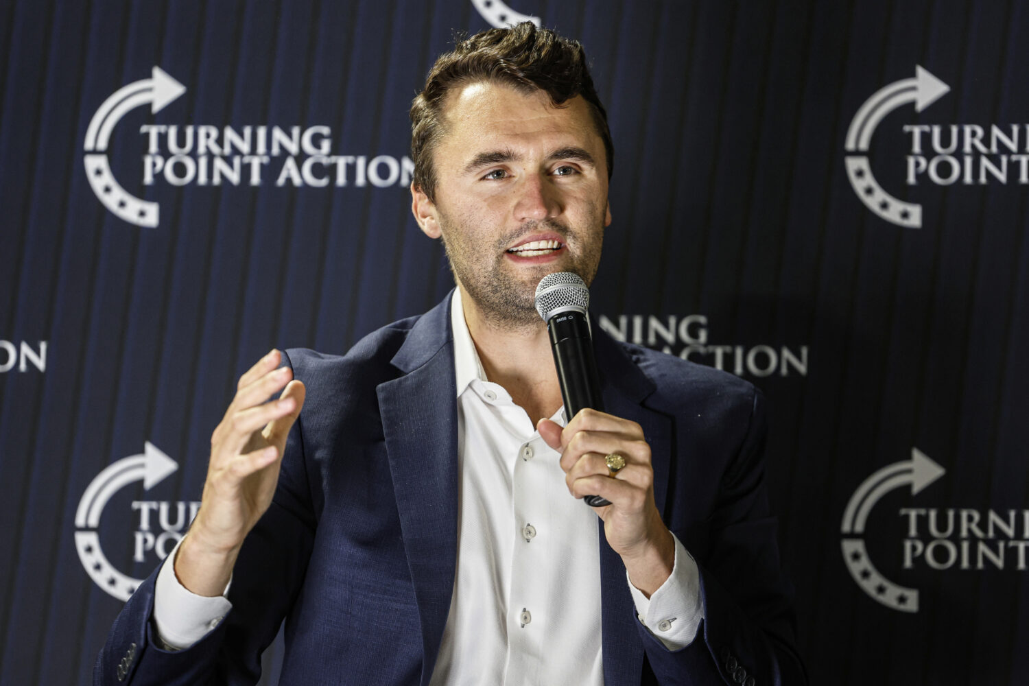 FILE - Charlie Kirk speaks during a town hall meeting on March 17, 2025, in Oconomowoc, Wis. (AP Ph...