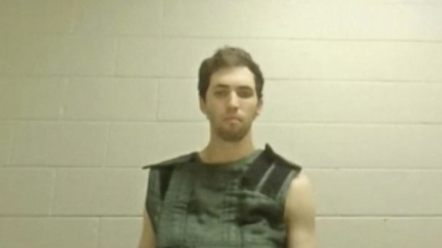 In this image from video provided by Utah State Courts, Tyler James Robinson attends a virtual cour...