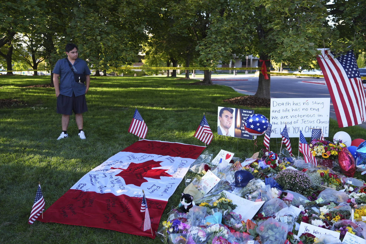 Utah Valley University student Alec Vera stands near a memorial for Charlie Kirk on Friday, Sept. 1...