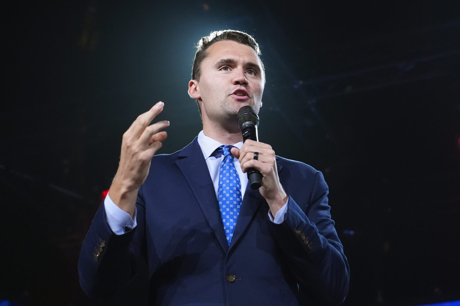 FILE - Turning Point USA Founder Charlie Kirk speaks at a Turning Point event prior to Republican v...