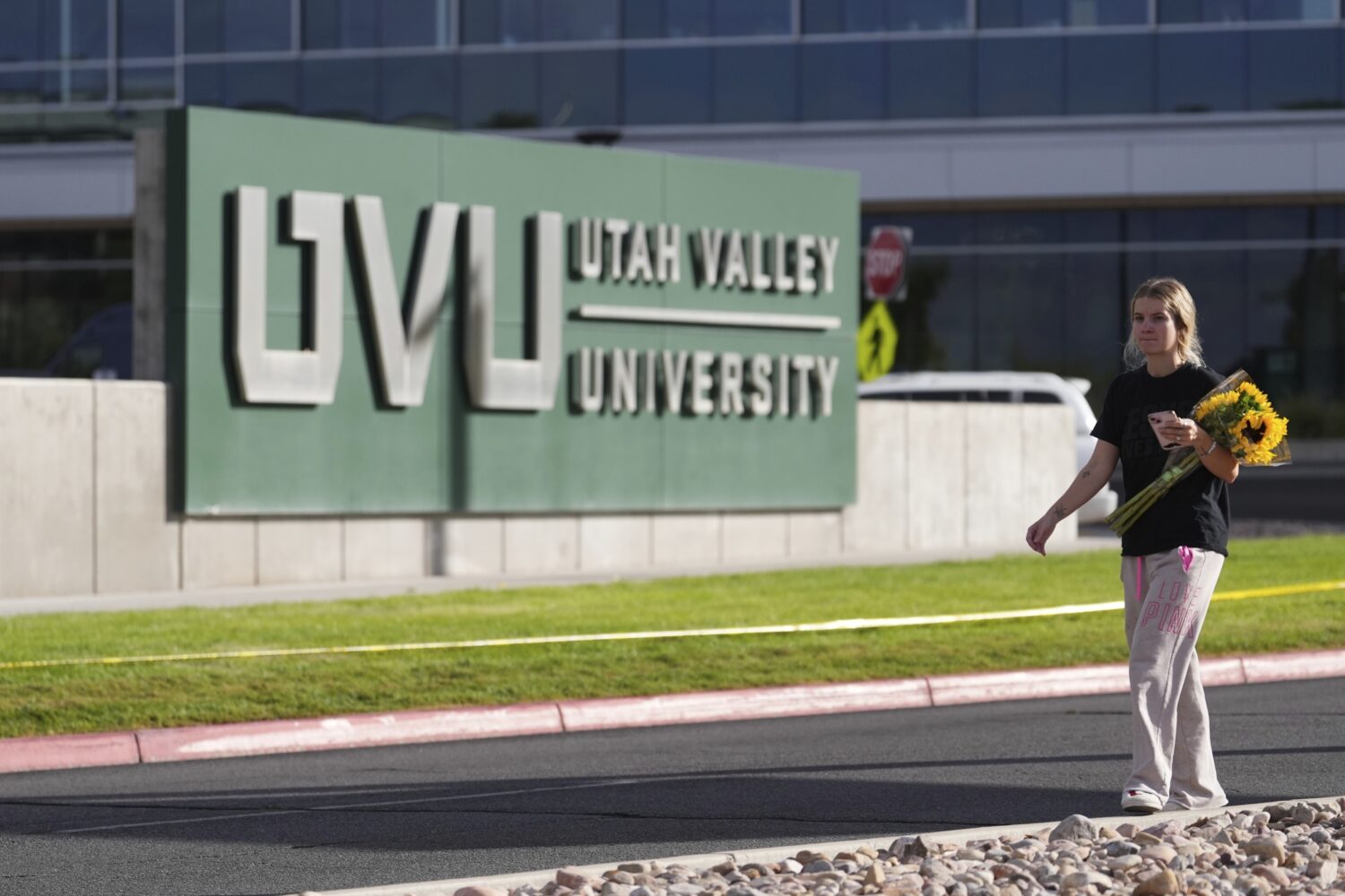 Meagan Bradley walks to a memorial for Charlie Kirk at Utah Valley University in Orem, Utah, Friday...