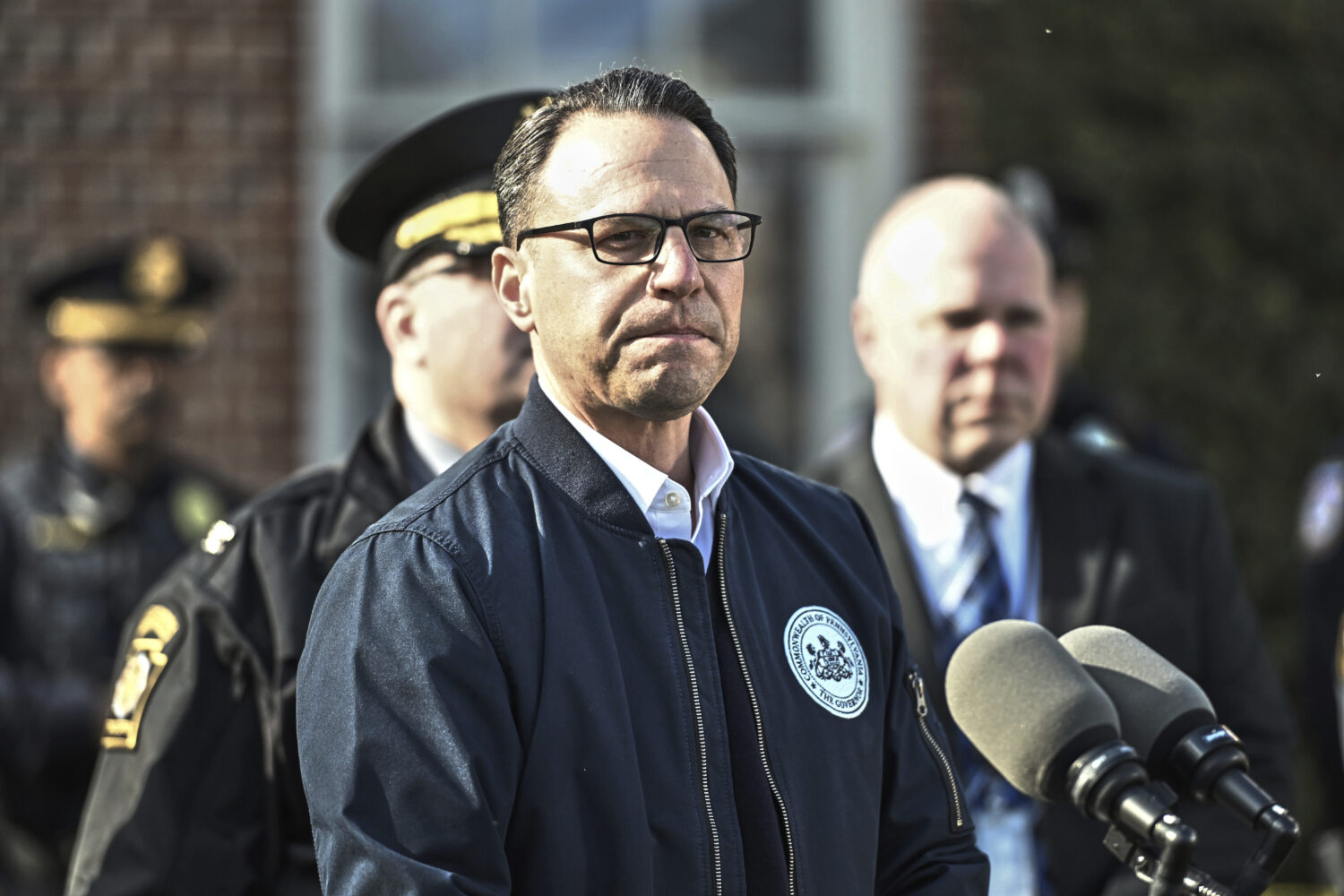 FILE - Pennsylvania Gov. Josh Shapiro pauses during a news conference at the governor's official re...