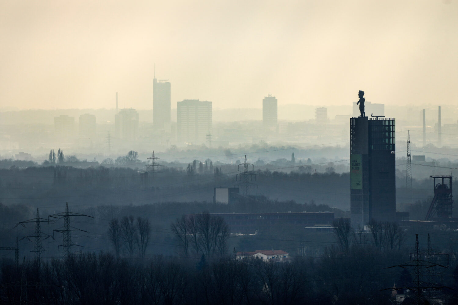 FILE - The city center of Essen is seen through the fog as German Federal Environment Agency warns ...