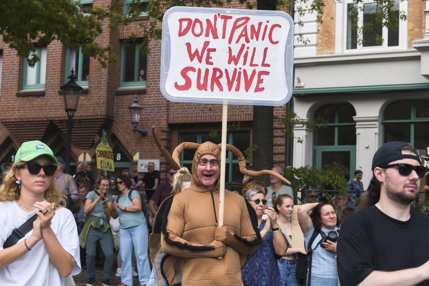 People attend a "Fridays for Future" demonstration at the fish market in Hamburg, Saturday Sept. 20...