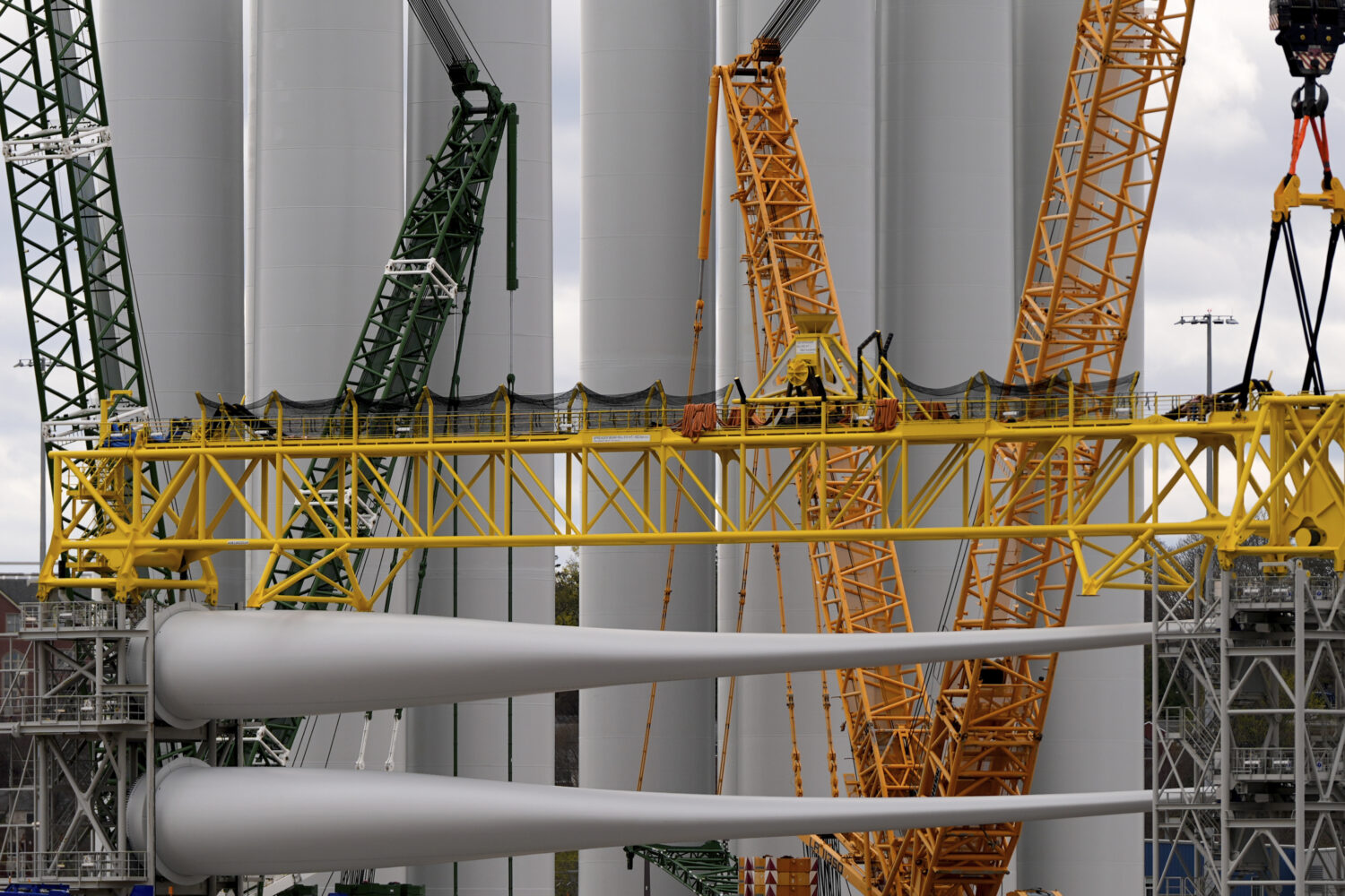 FILE - Wind turbine components sit at New London State Pier, April 16, 2025, in New London, Conn. (...