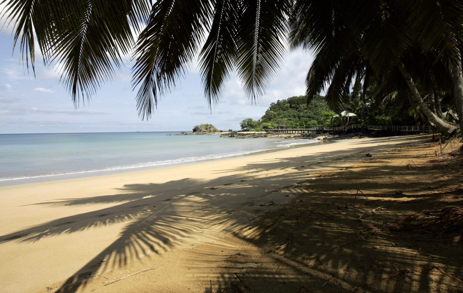 FILE - The empty beach of the Bombom resort on Principe Island, Nov. 8 2006. (AP Photo/Armando Fran...