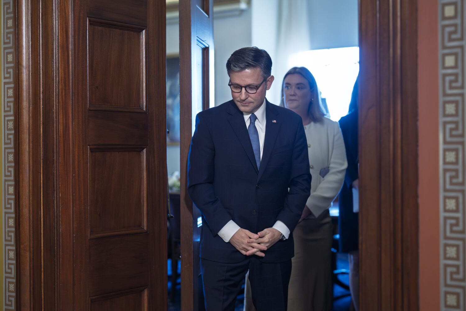 As lawmakers debate a government funding extension, Speaker of the House Mike Johnson, R-La., await...