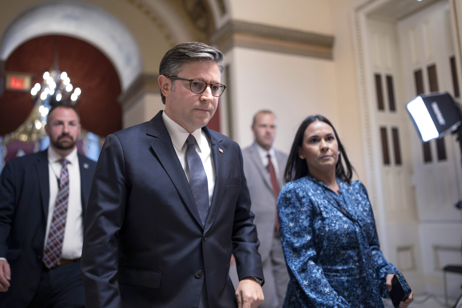 Speaker of the House Mike Johnson, R-La., walks to the chamber to begin the legislative week, at th...
