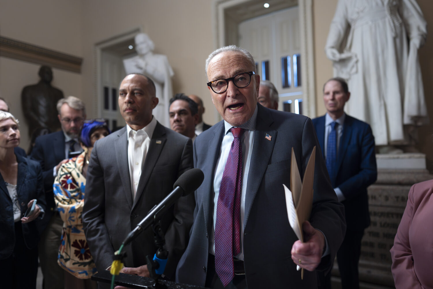 Senate Minority Leader Chuck Schumer, D-N.Y., joined at left by House Minority Leader Hakeem Jeffri...
