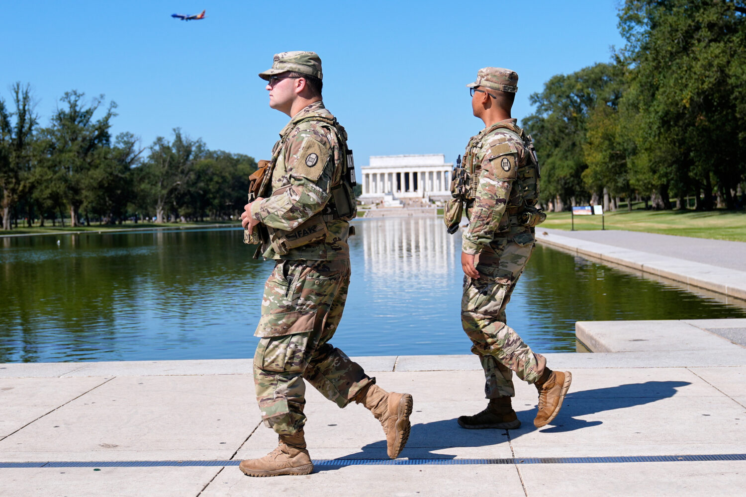 Members of the South Carolina National Guard patrol with the Lincoln Monument in the background, Fr...
