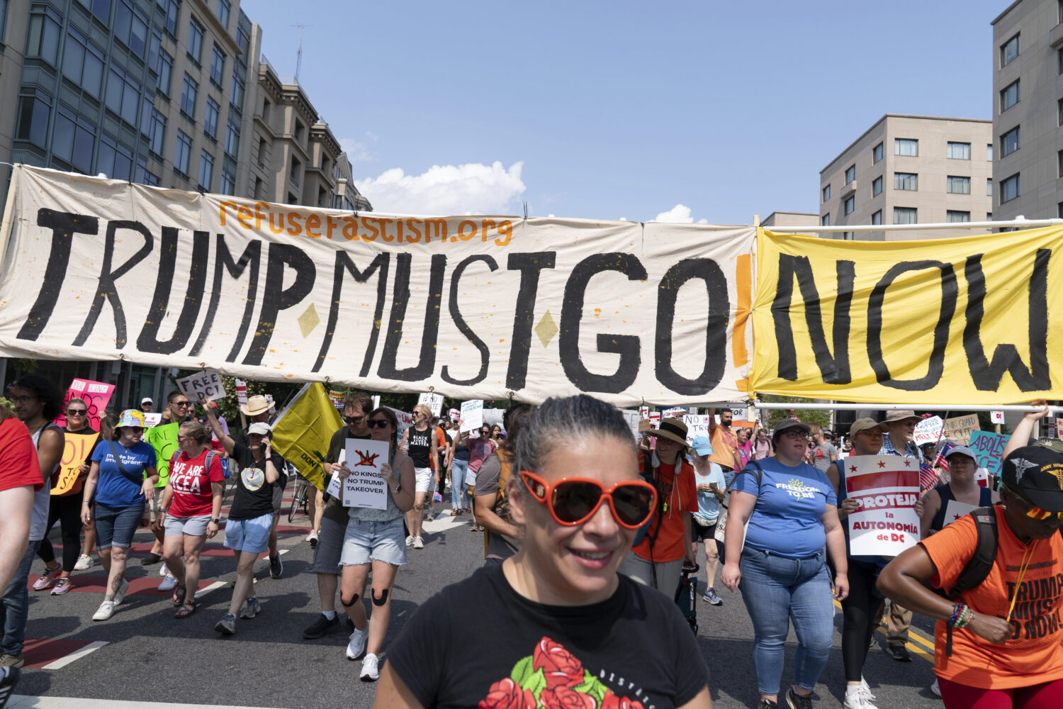 Demonstrators protest against President Donald Trump's deployment of federal law enforcement and Na...