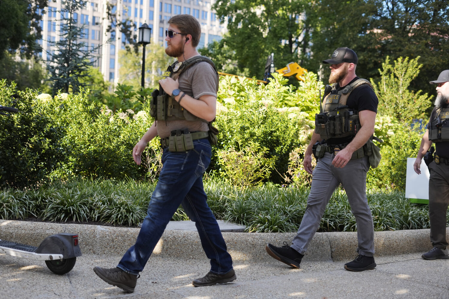Law enforcement officer from Homeland Security Investigations (HSI) walking back to their vehicle a...
