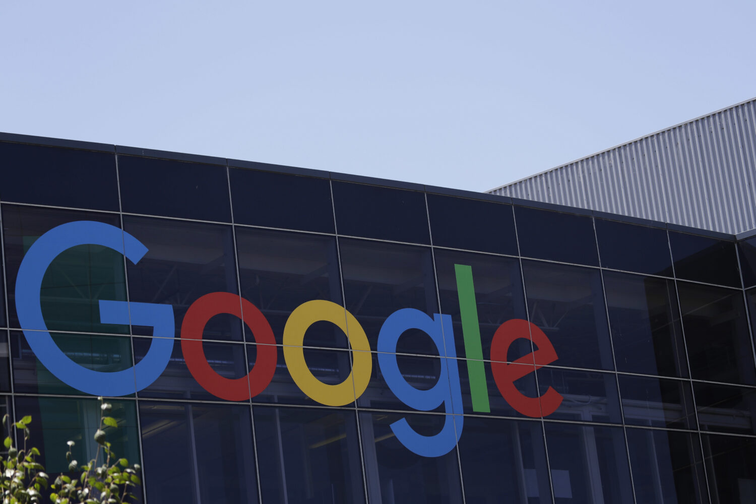 FILE - The Google logo sits on the company's headquarters in Mountain View, Calif., July 19, 2016. ...