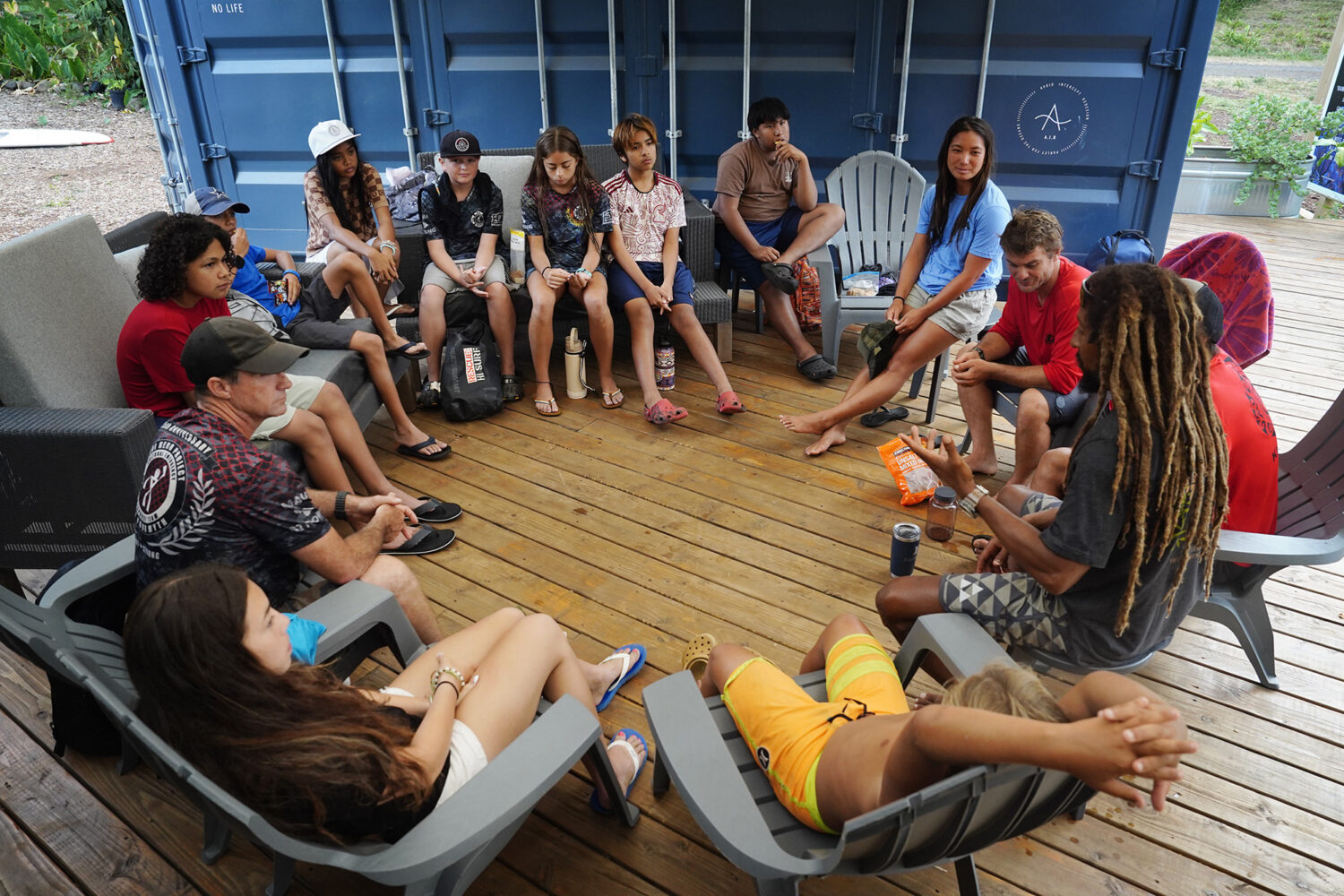 Maui Hero Project and with Kahākūkahi Ocean Academy members talk after their water academy day in...
