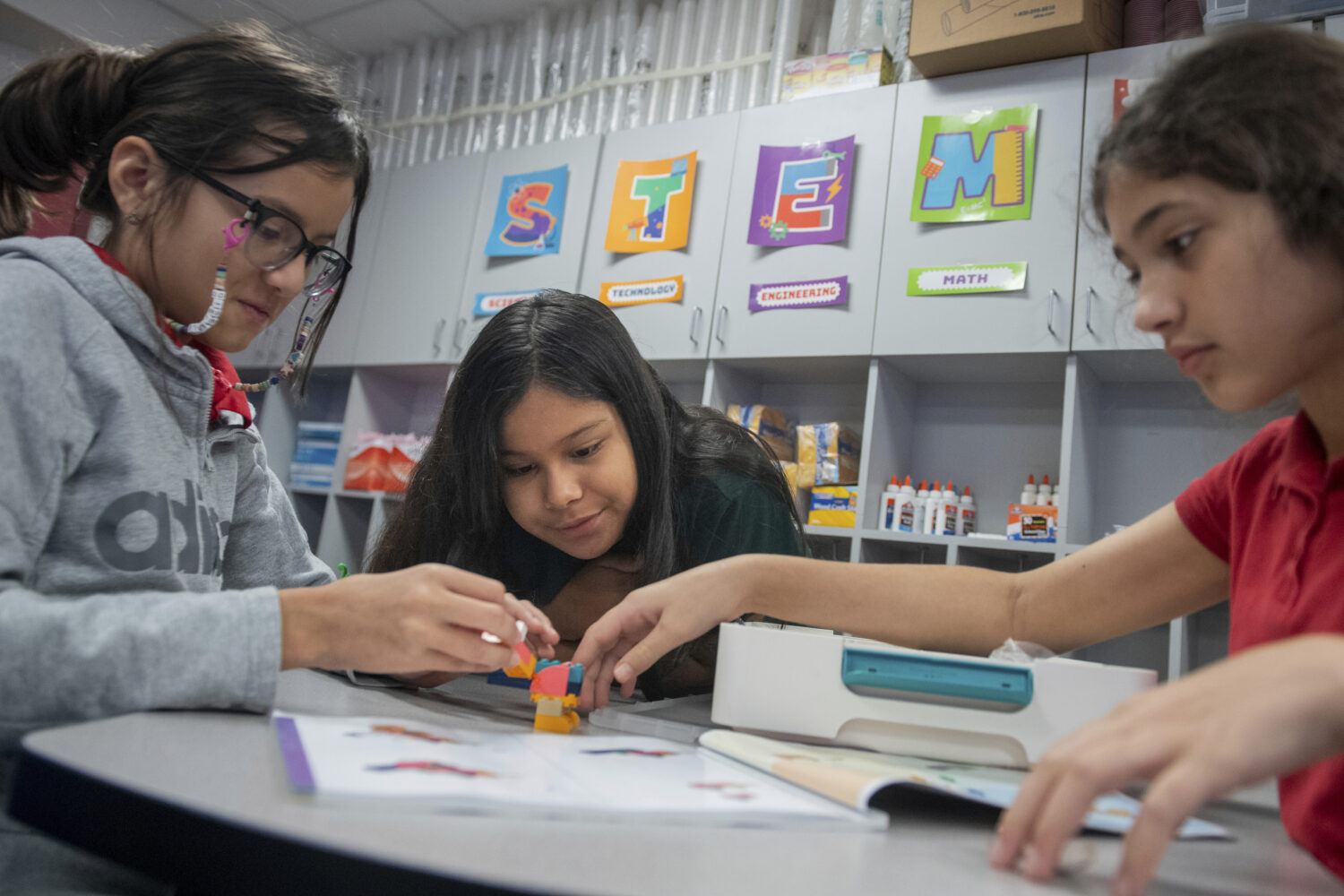 Students build a dragon out of LEGO bricks during class at Lively Elementary on Thursday, Aug. 21, ...
