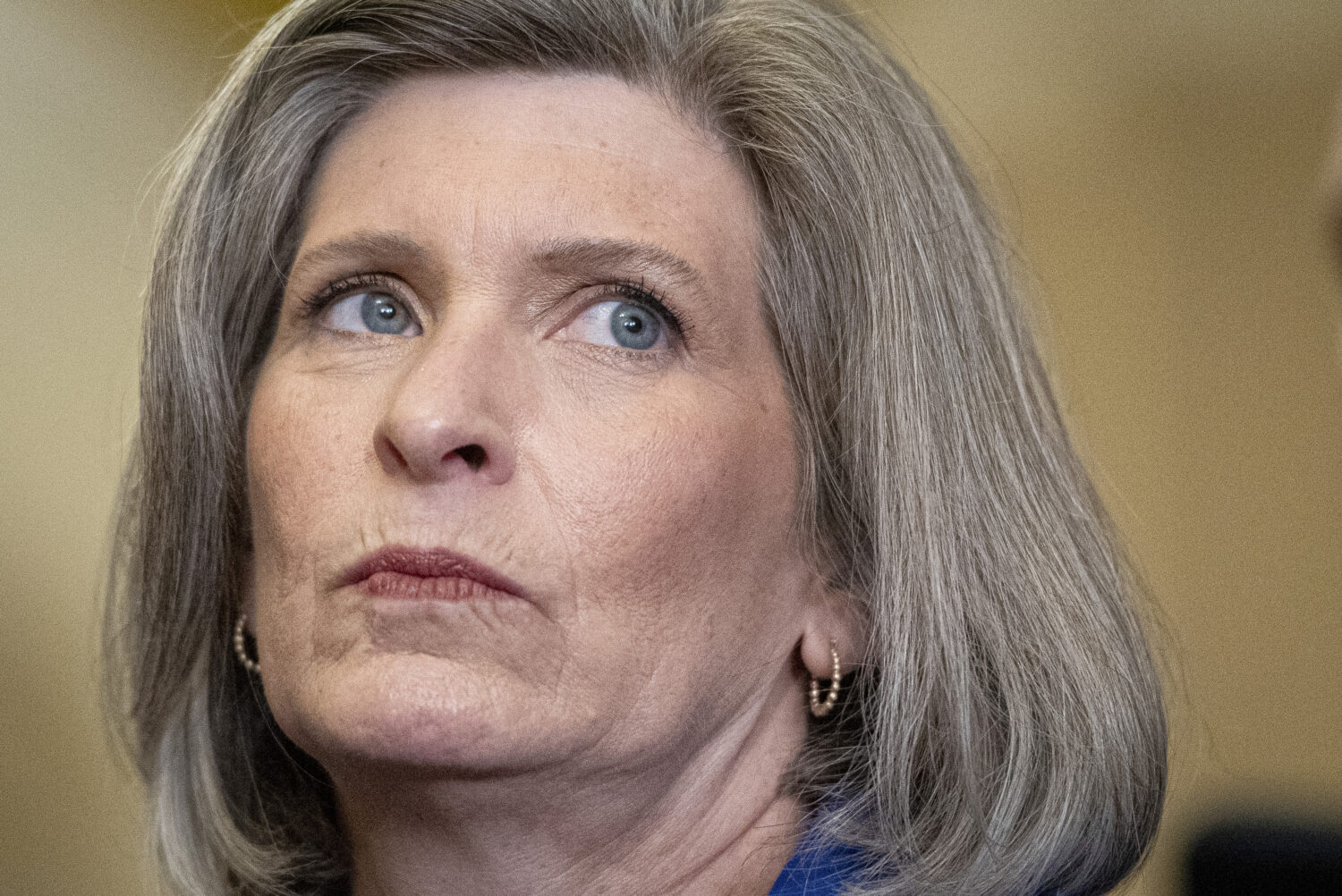 FILE - Sen. Joni Ernst, R-Iowa, speaks with reporters on Capitol Hill in Washington, July 9, 2024. ...