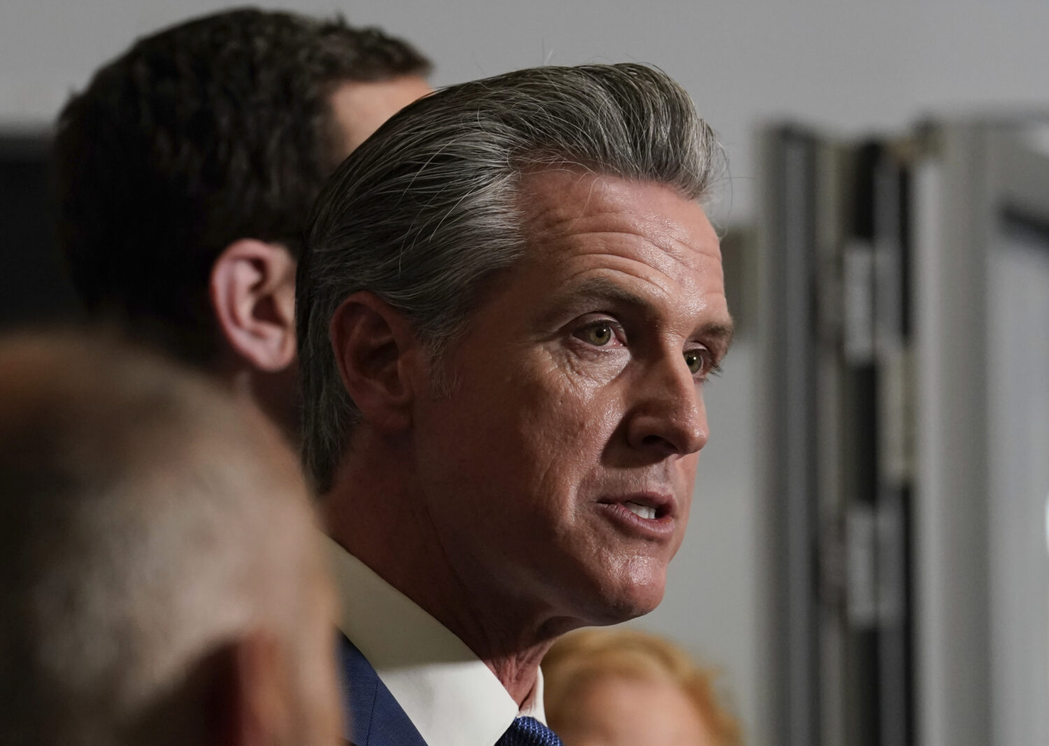 Gov. Gavin Newsom speaks after signing legislation calling for a special election on a redrawn cong...