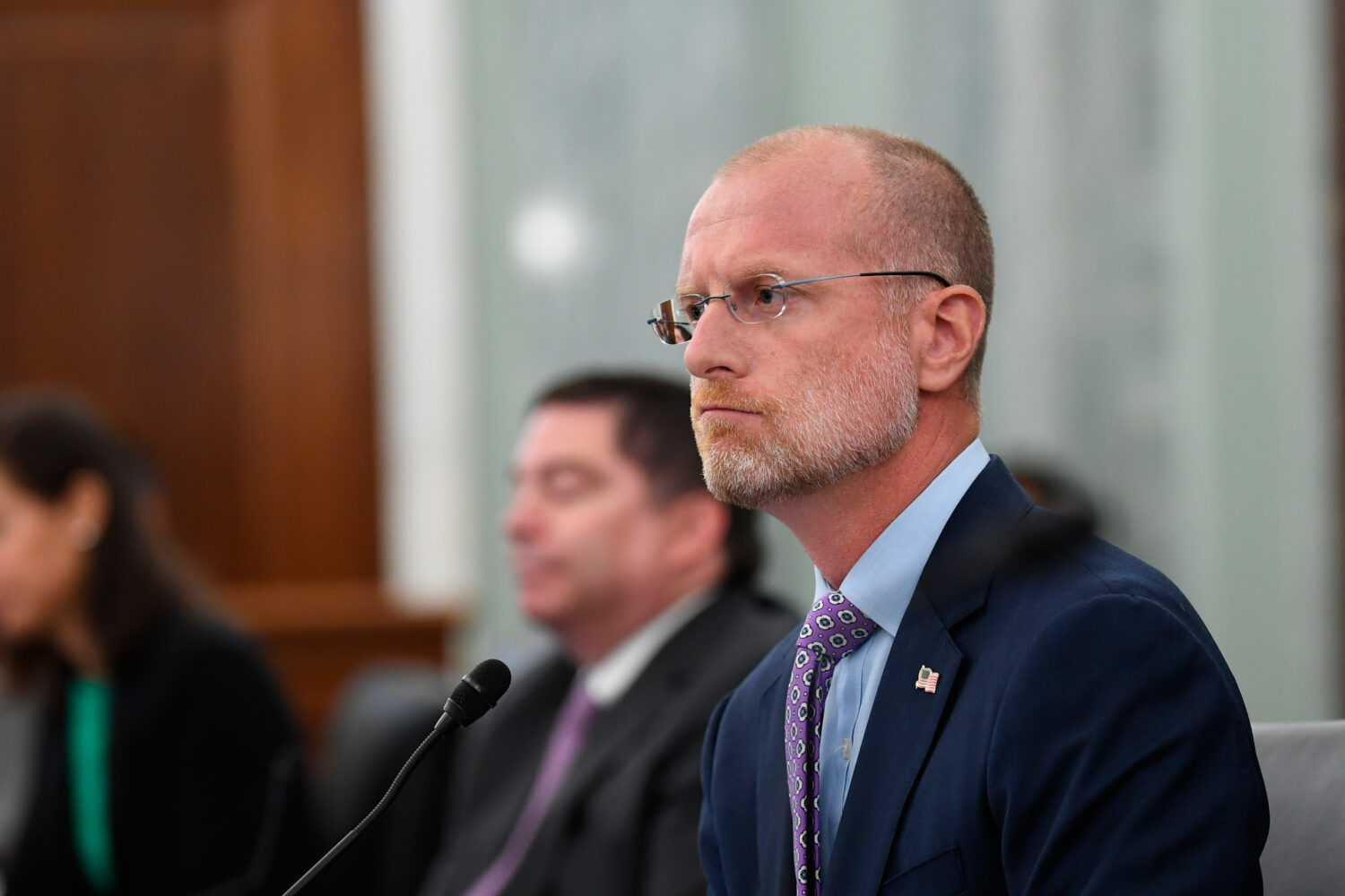FILE - Brendan Carr listens during a Senate Commerce, Science, and Transportation committee hearing...
