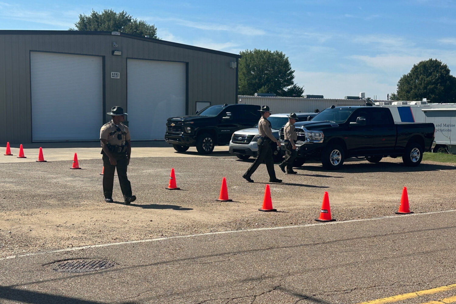 Tennessee Highway Patrol troopers are seen at a staging center for law enforcement on Tuesday, Sept...