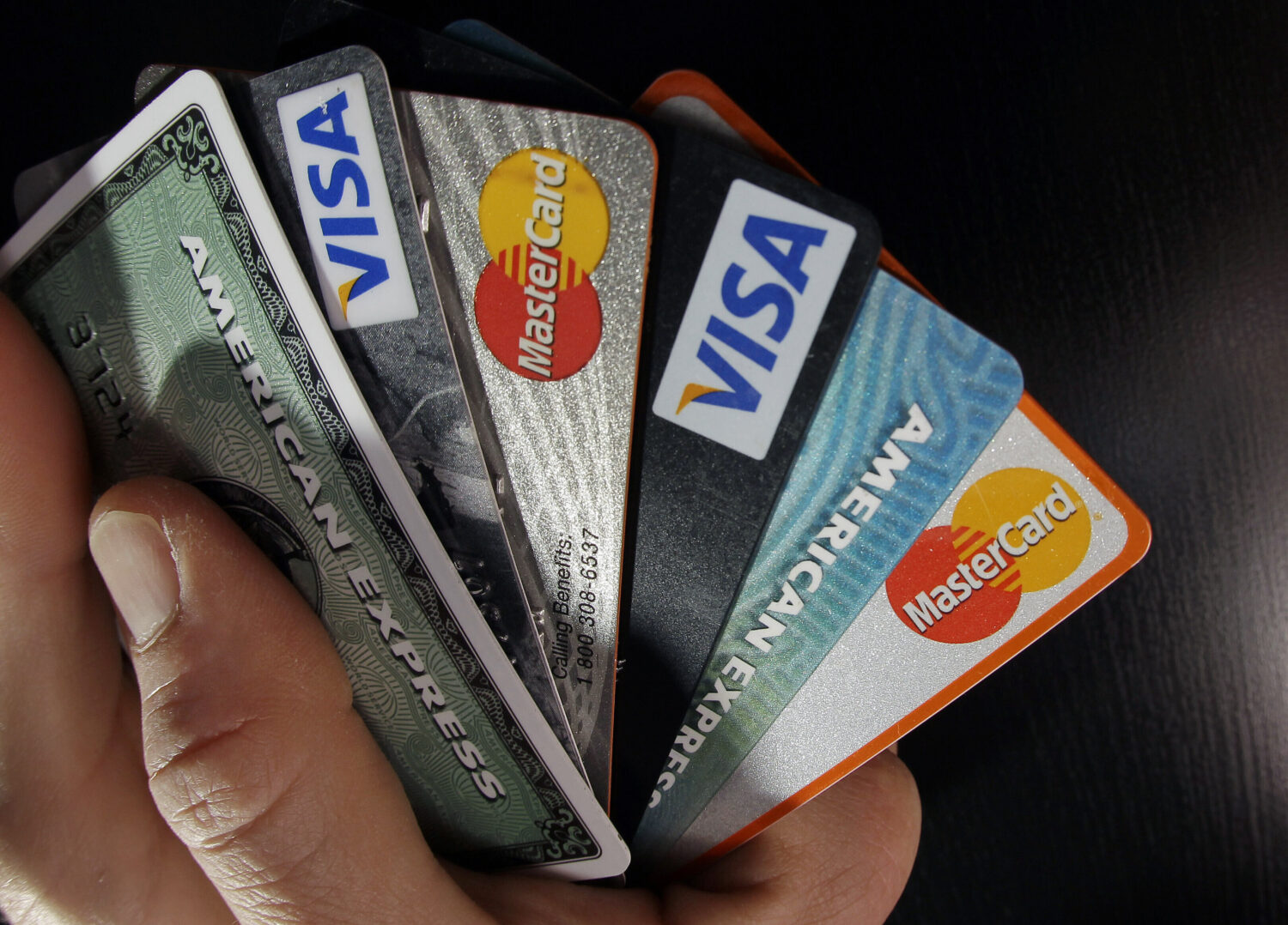 FILE - In this March 5, 2012, file photo, consumer credit cards are posed in North Andover, Mass. (...