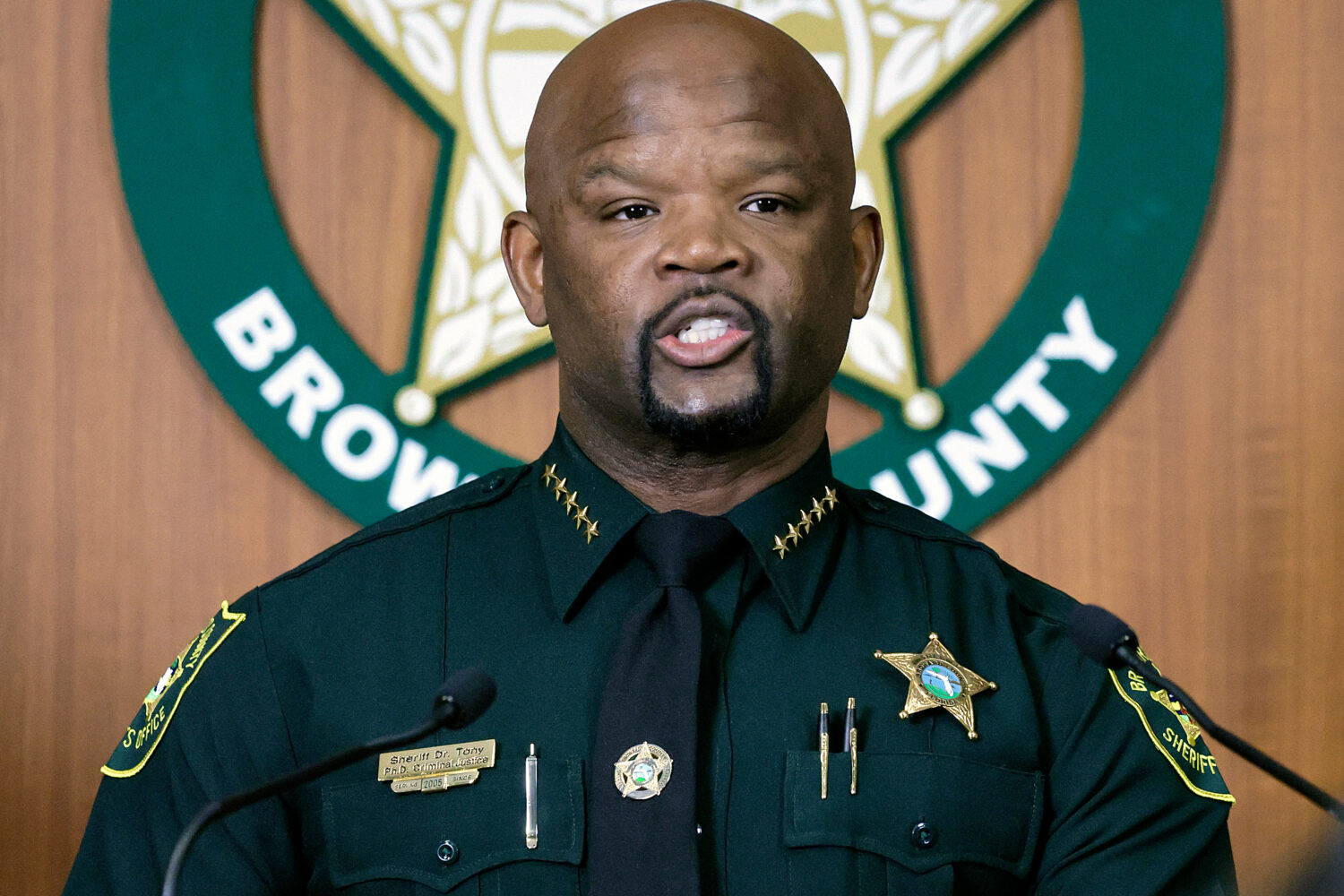 Broward Sheriff Gregory Tony and members of the Broward Sheriff's Office Internal Affairs Unit hold...