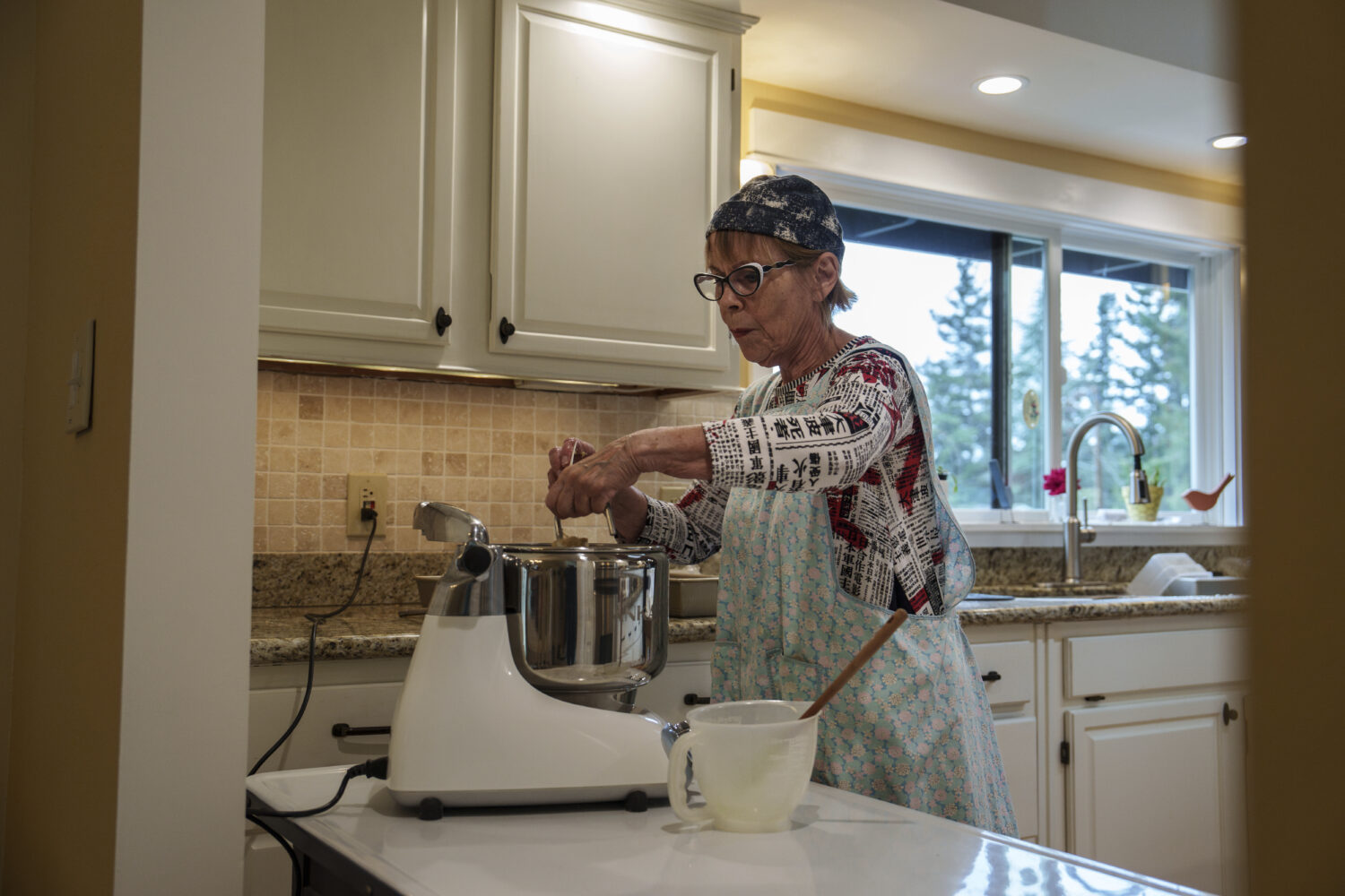 Cheryl Ewaldsen bakes bread for Community Loaves at her home in Edmonds, Wash., Saturday, Sept. 6, ...