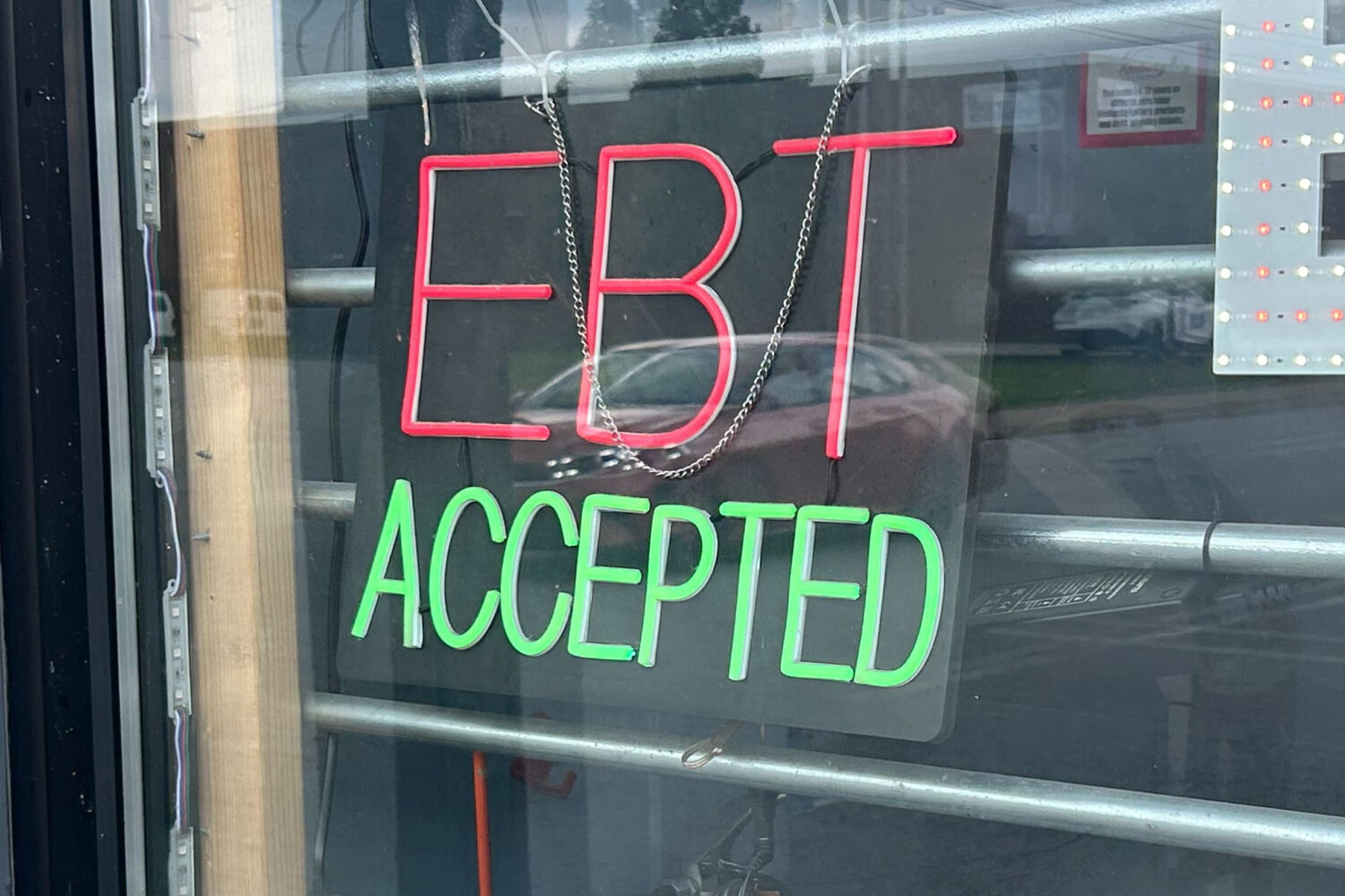 A sign advertises a store accepts Supplemental Nutrition Assistance Program (SNAP/EBT) in Louisvill...