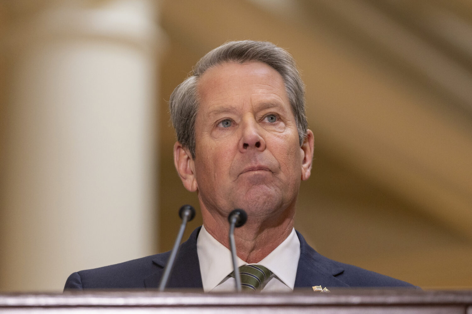 FILE - Gov. Brian Kemp speaks before signing the budget bill at the Capitol in Atlanta on Crossover...