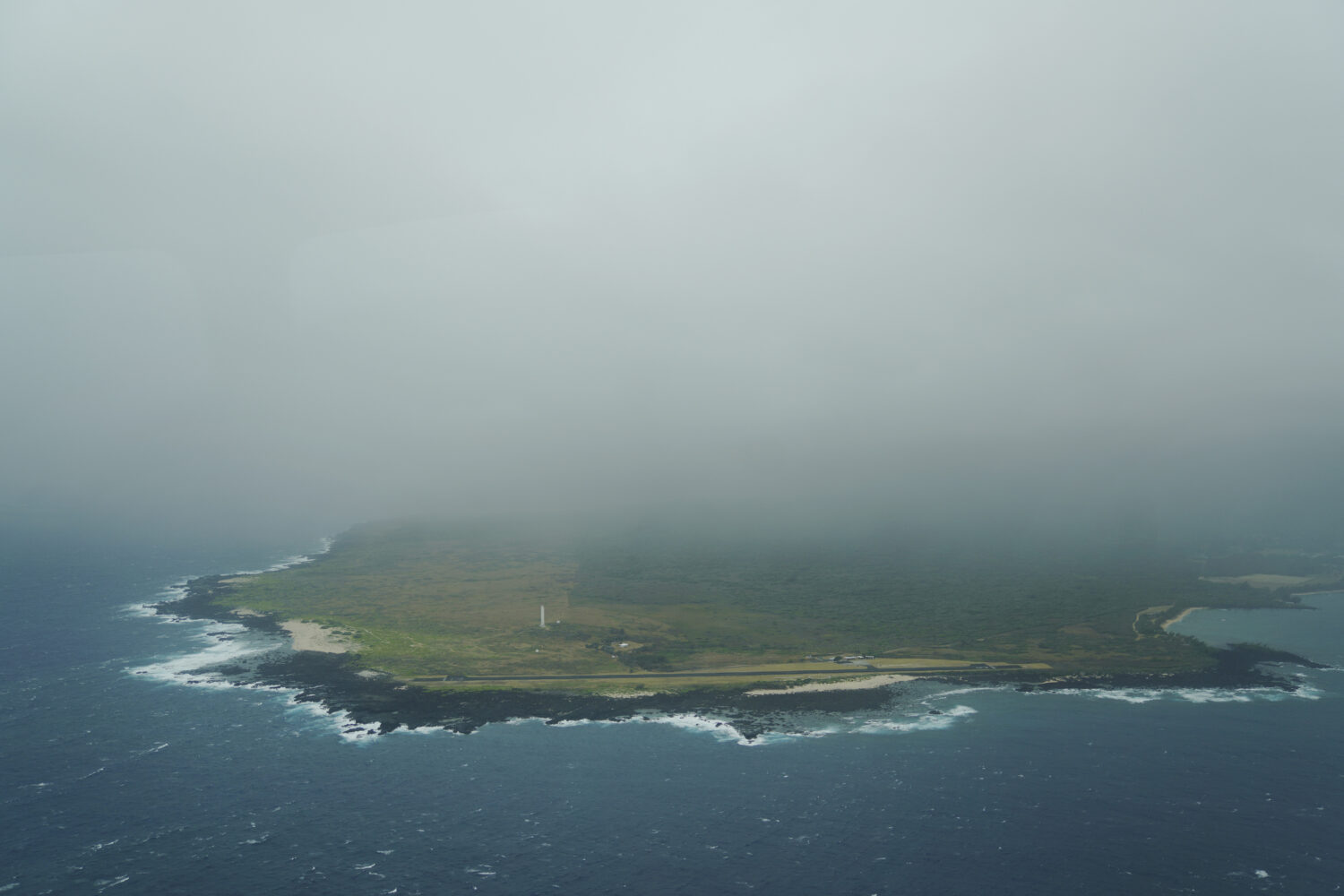 FILE - Clouds from a passing storm cover the peninsula of Kalaupapa, Hawaii, July 19, 2023. (AP Pho...