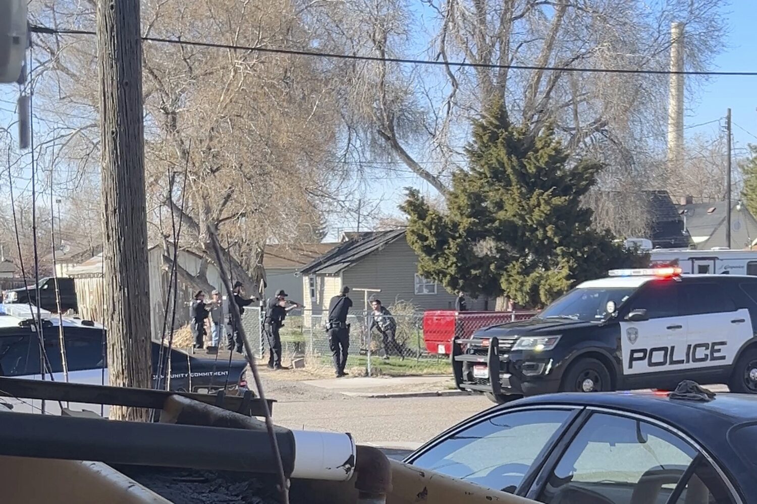 FILE - In this image taken from video, police are seen shortly before opening fire on a teen on the...