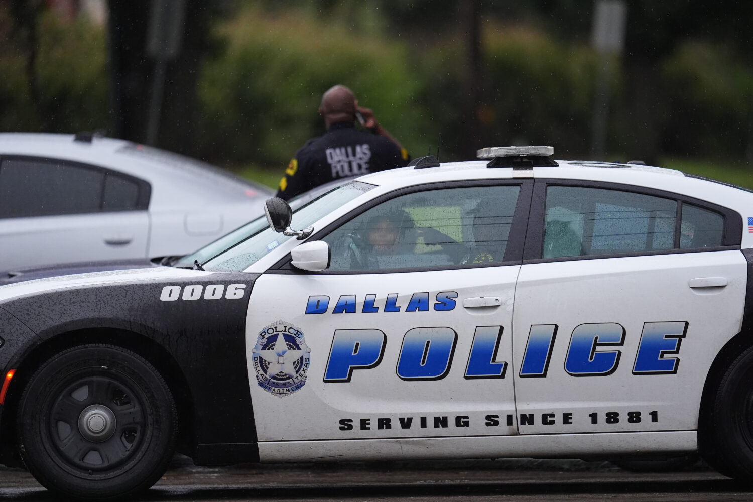 Police block off the street close to a U.S. Immigration and Customs Enforcement office after a repo...