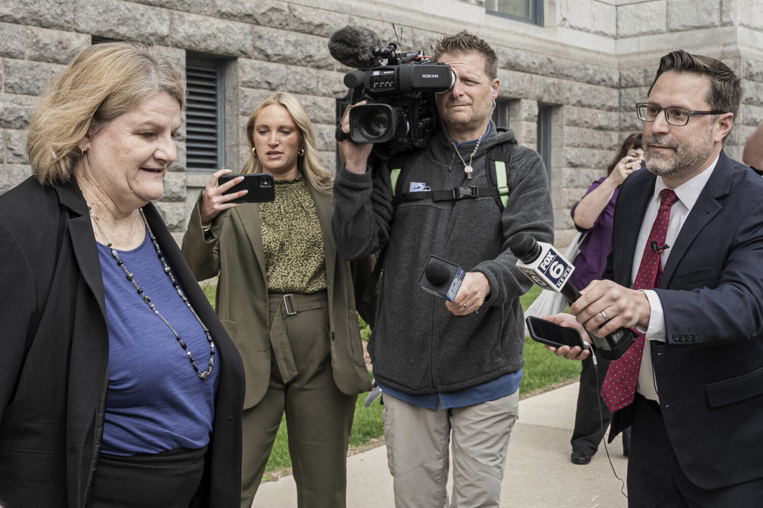 FILE - Milwaukee County Circuit Judge Hannah Dugan leaves the federal courthouse after a hearing in...