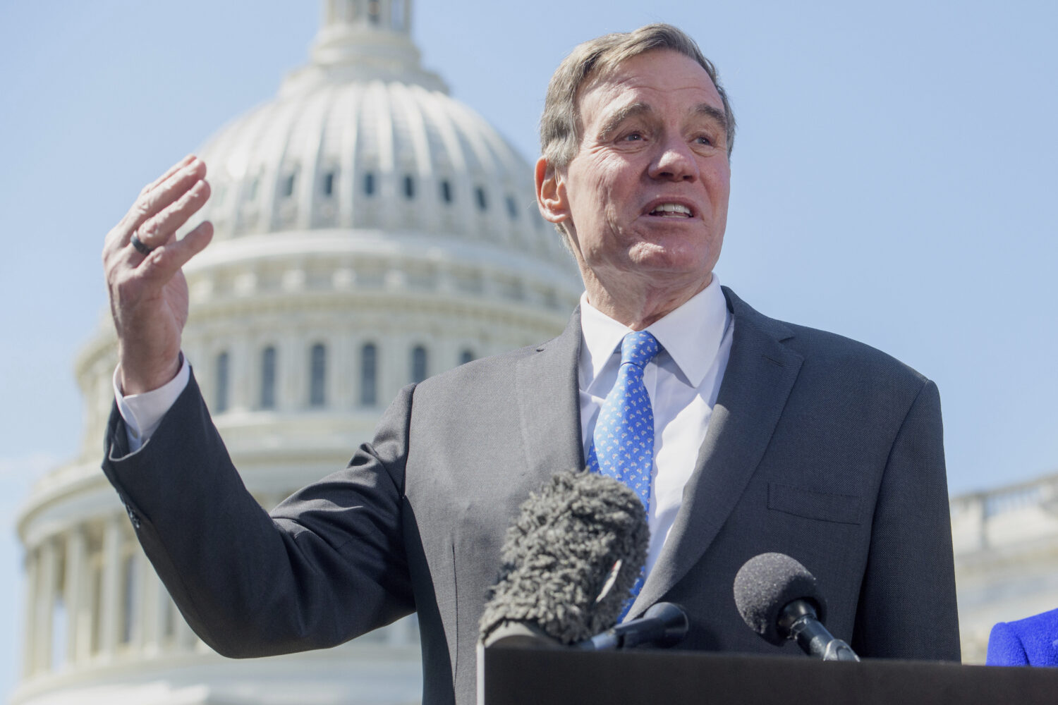 FILE - Sen. Mark Warner, D-Va., speaks during a news conference at the Capitol, April 1, 2025, in W...