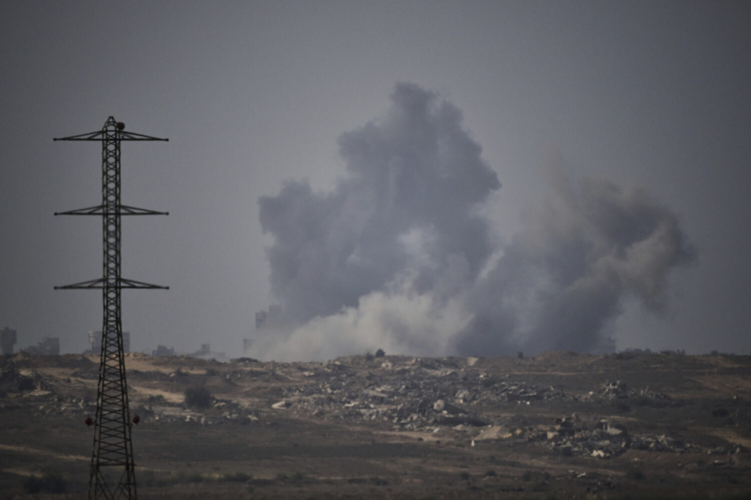 Smoke rises to the sky following an Israeli military strike in the Gaza Strip, as seen from souther...