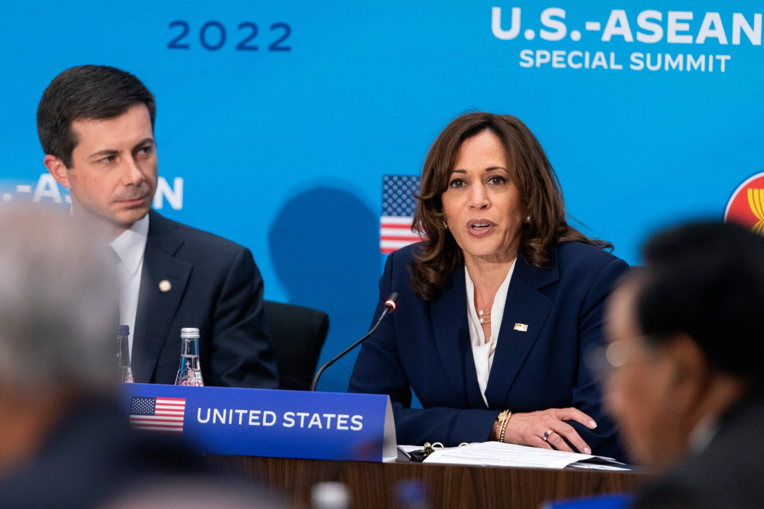 FILE - Vice President Kamala Harris, right, next to Transportation Secretary Pete Buttigieg, speaks...
