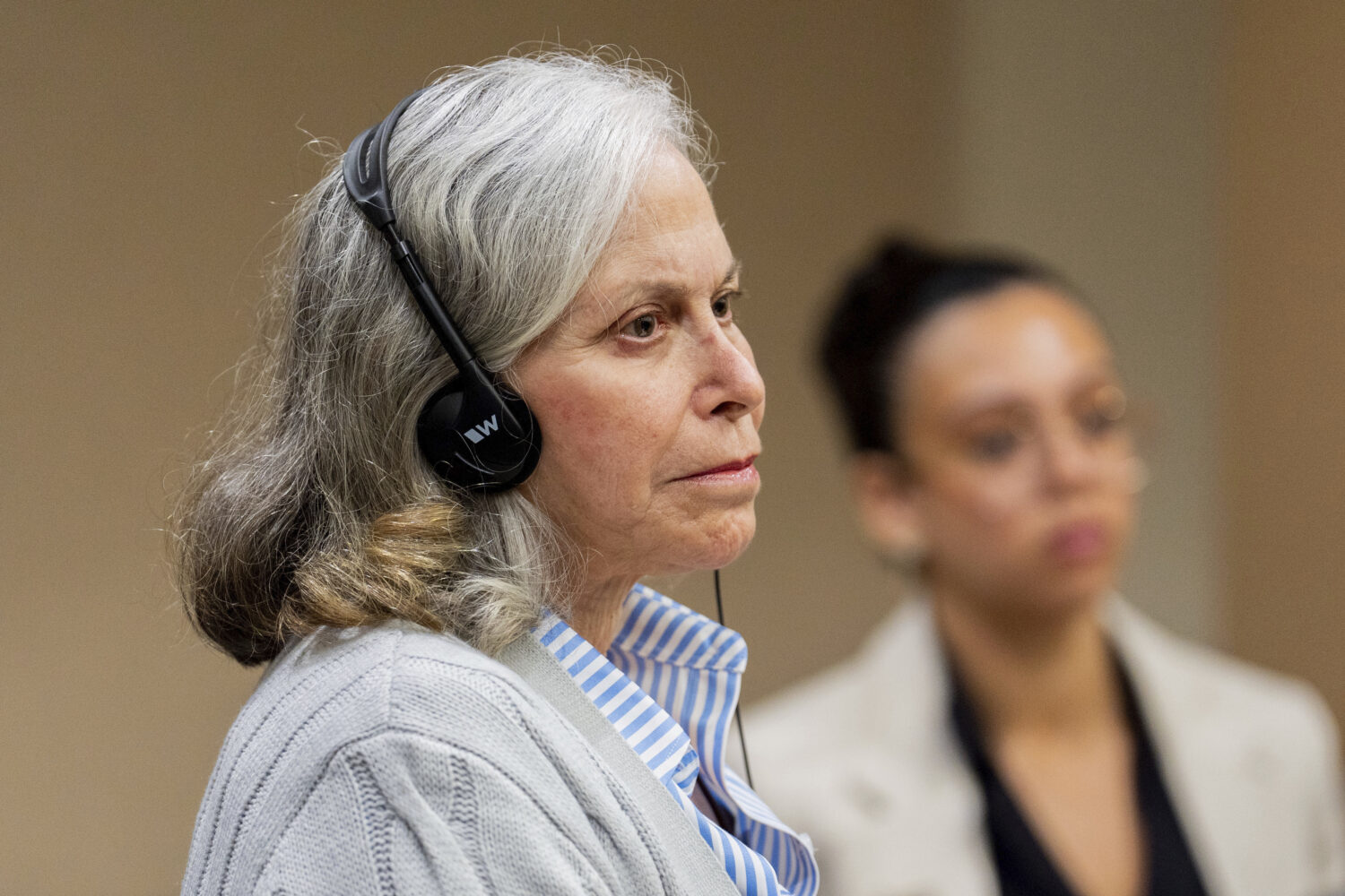 Donna Adelson listens to her defense team's opening statements in the courtroom on Friday, Aug. 22,...