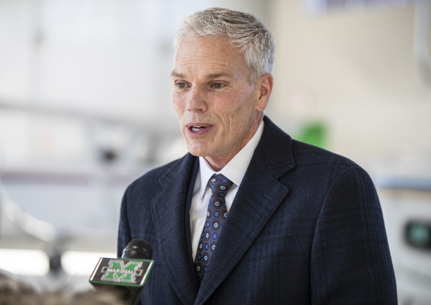 FILE - Marshall University President Brad Smith speaks with members of the media, Jan. 26, 2022, at...