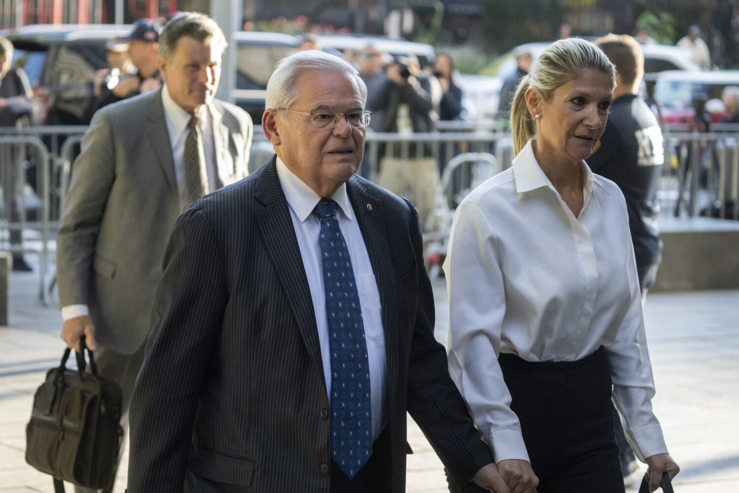 FILE - Democratic U.S. Sen. Bob Menendez of New Jersey, left, and his wife, Nadine Menendez, arrive...