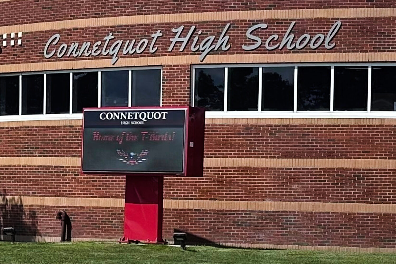 An electronic display shows the new mascot name, T-Birds, outside Connetquot High School in Bohemia...