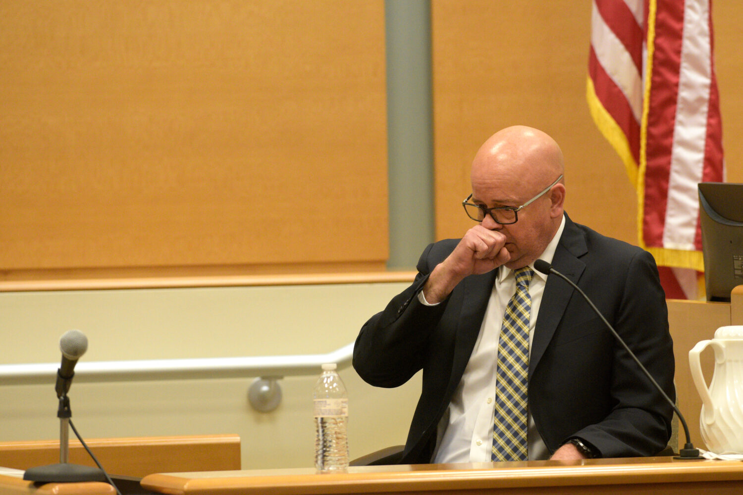 FILE - FBI agent William Aldenberg tries to compose himself while testifying during the first day o...
