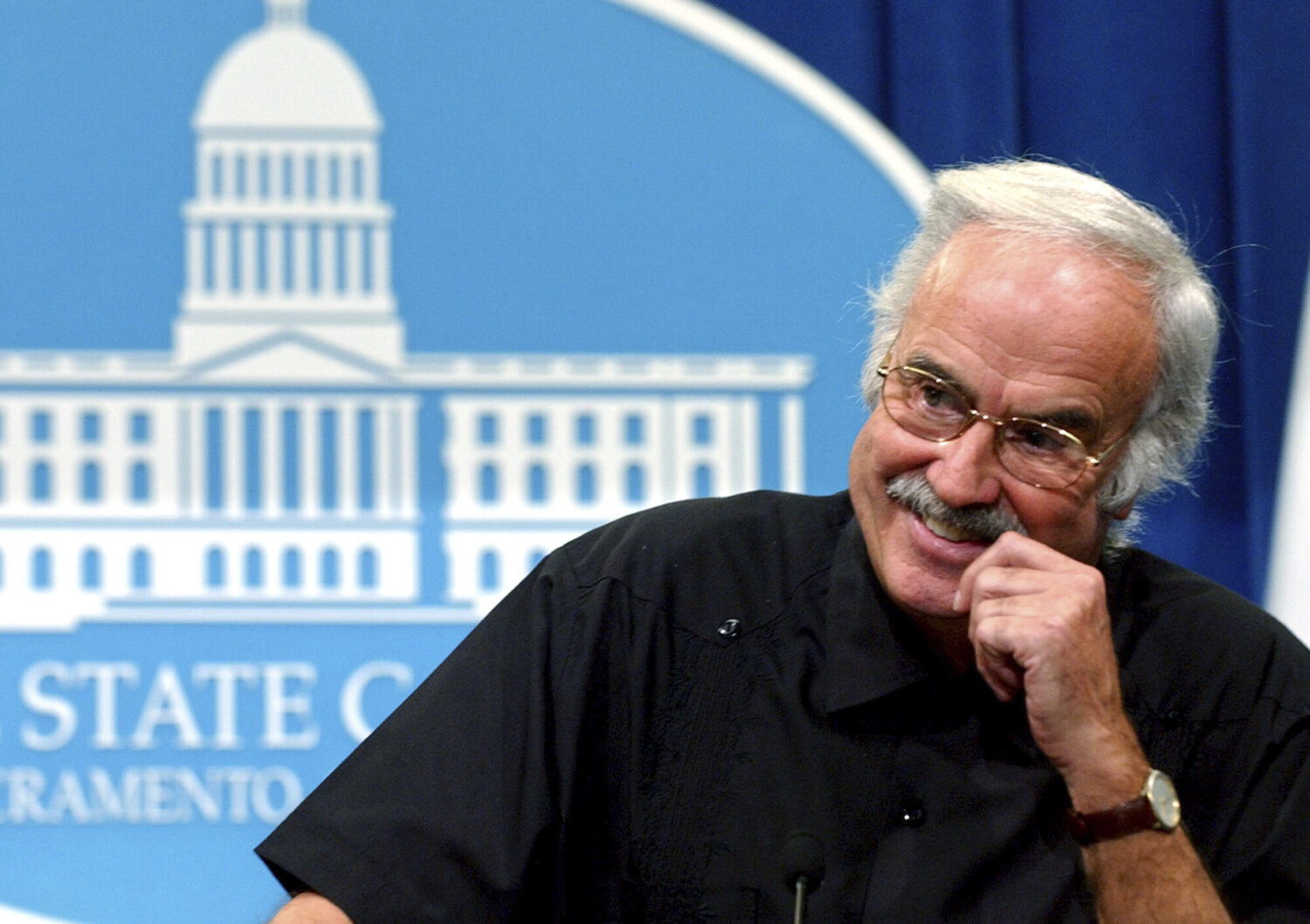 FILE - State Sen. President Pro Tem John Burton, D-San Francisco, smiles as he reminisces about his...