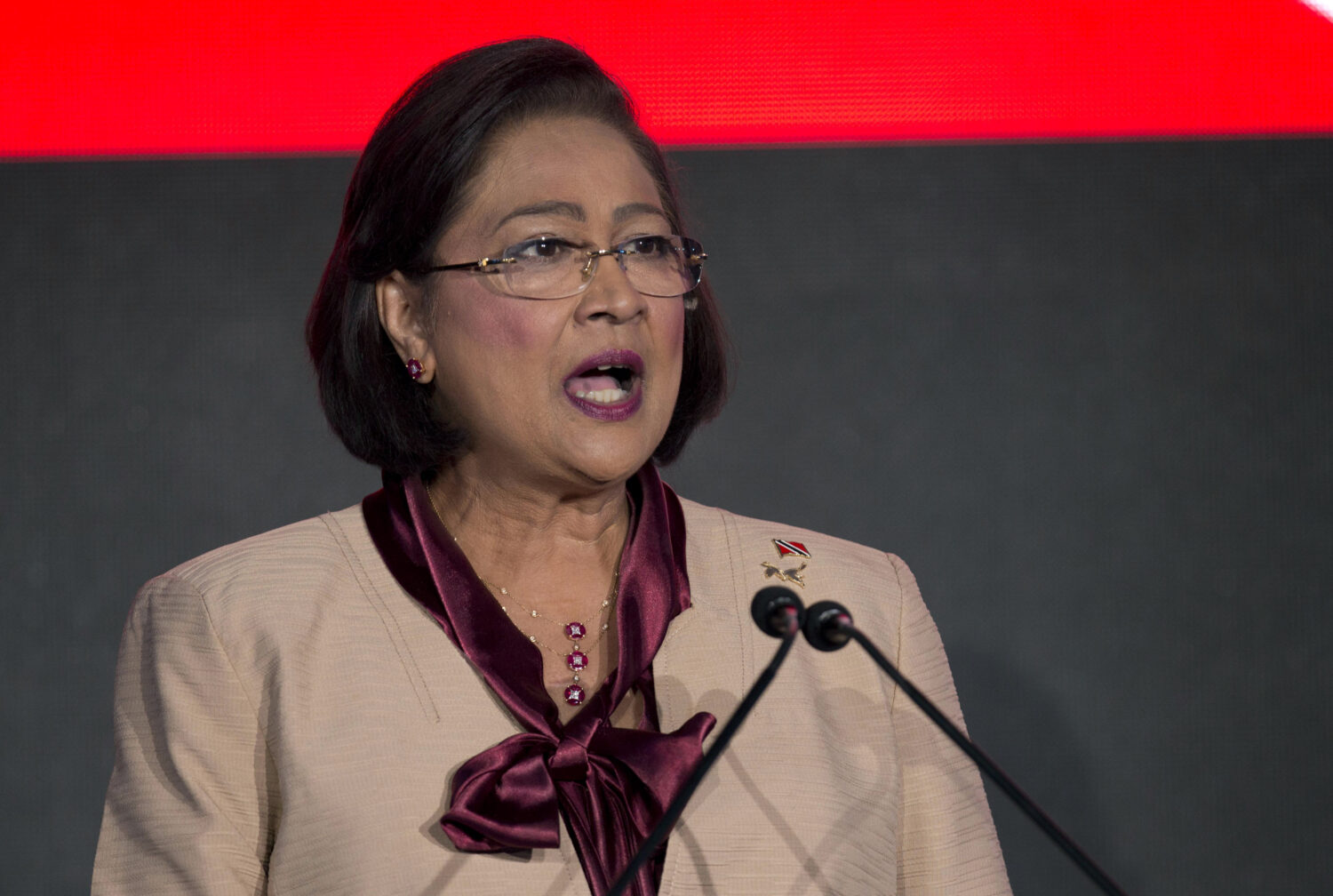 FILE - Trinidad and Tobago's Prime Minister Kamla Persad-Bissessar delivers her speech during the C...