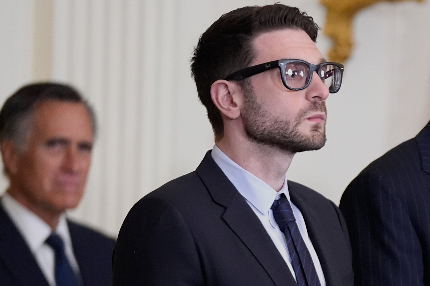 FILE - Alex Soros, left, on behalf of his father George Soros, in the East Room of the White House,...