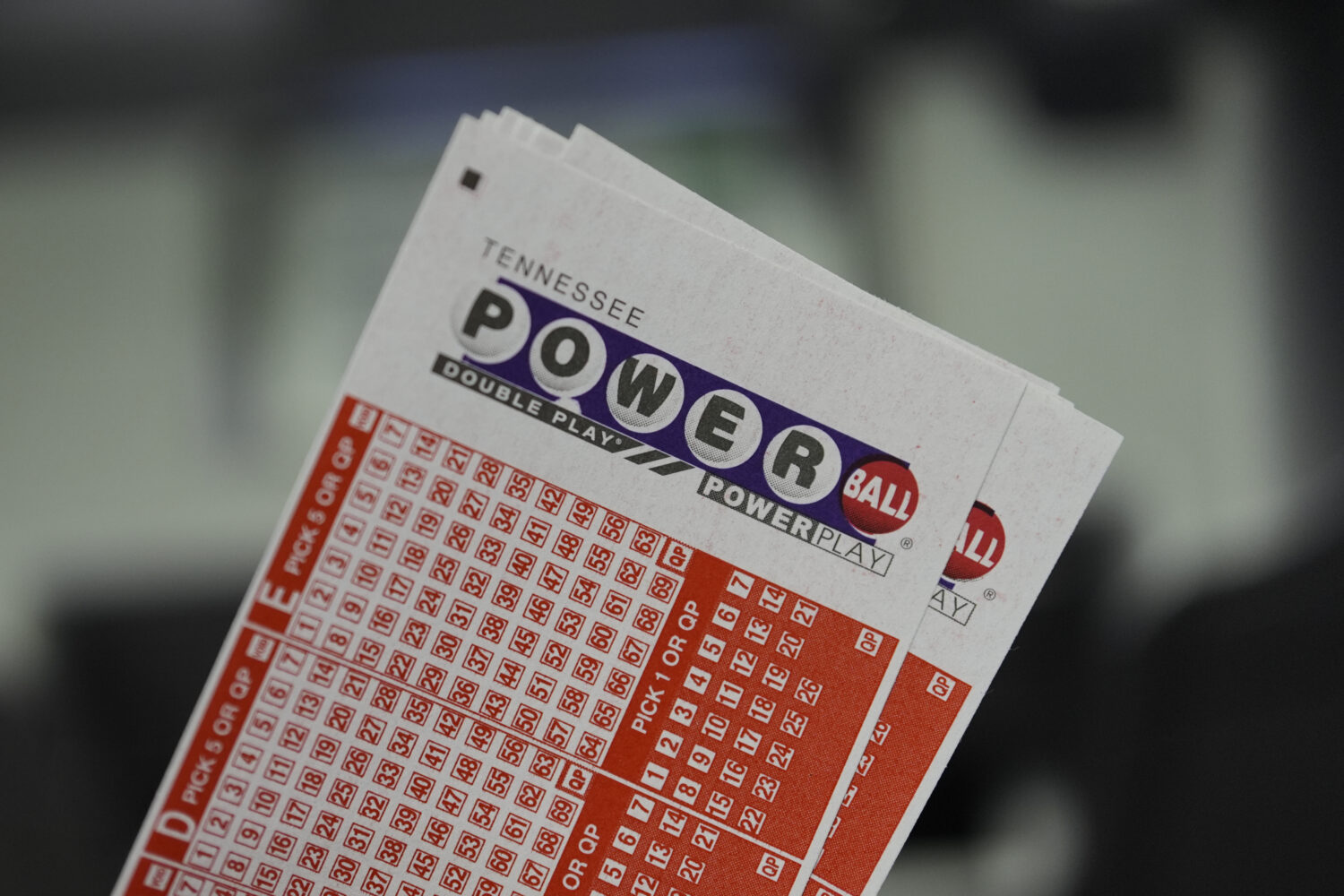 Powerball play slips are seen Friday, Aug. 29, 2025, in Nashville, Tenn. (AP Photo/George Walker IV...