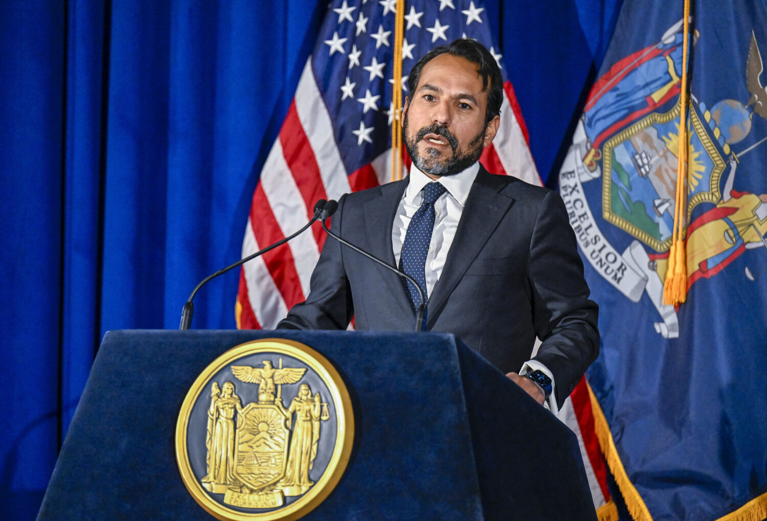 FILE - Robert Mujica, budget director of the State of New York, answers budget questions during a n...