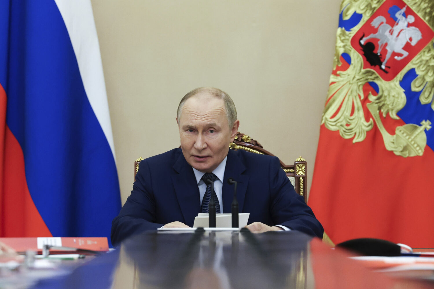Russian President Vladimir Putin chairs a Security Council meeting at the Kremlin in Russia, Monday...