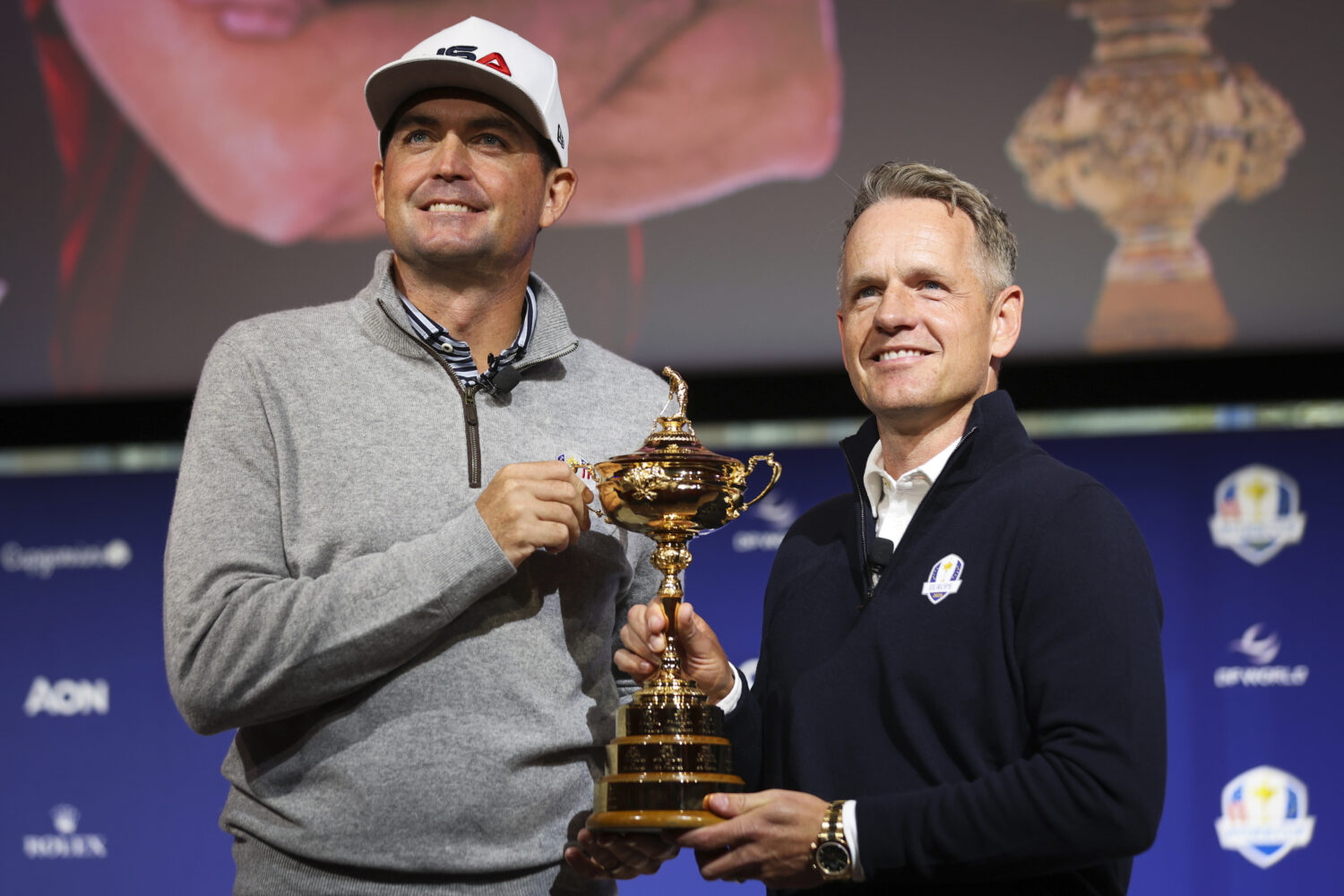 FILE - United States captain Keegan Bradley, left, and Europe captain Luke Donald pose for a photo ...
